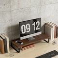 Minimalist desk in neutral finish on clean workspace side view